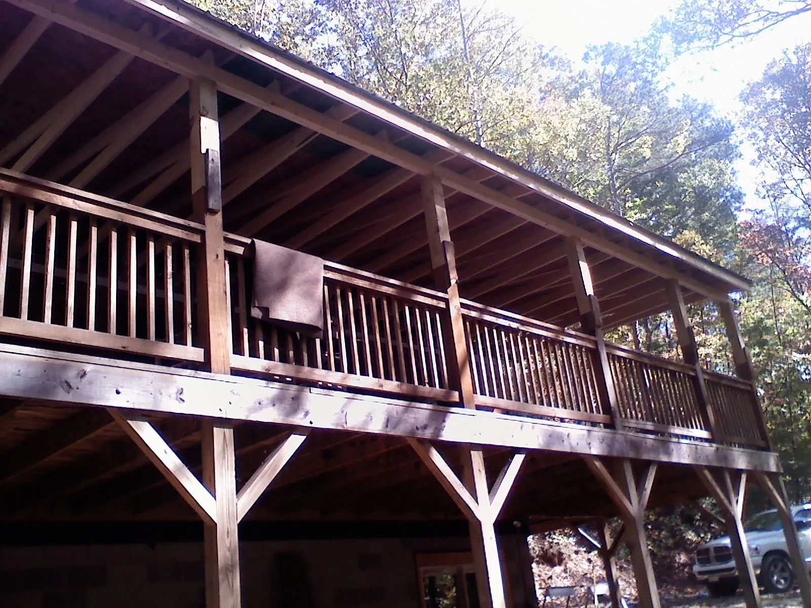 Timber framing under a new elevated porch and deck — Roof Leak Repair in Butte by Roofing Brothers